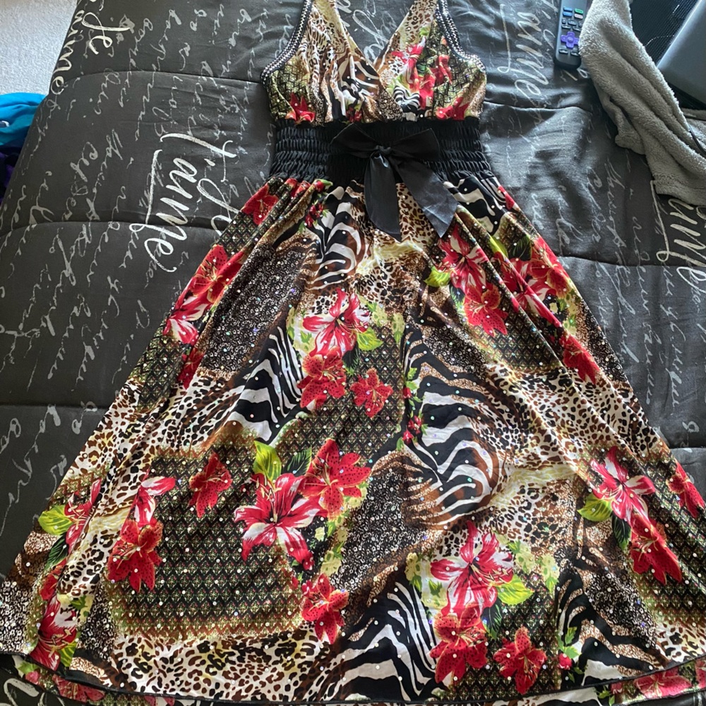 Size Medium. Color sequined dress, light silky material.